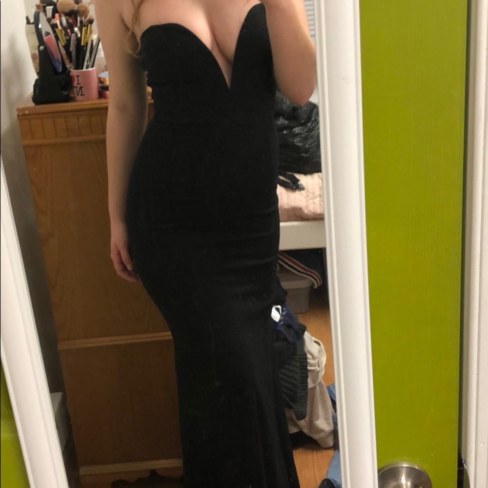 Long black prom dress with deep V-neck